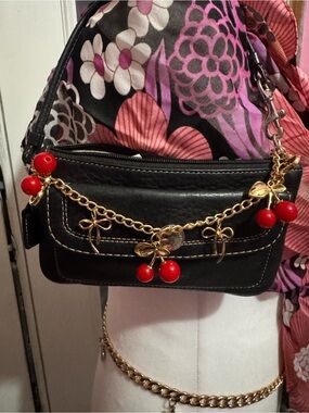 Coach Black Leather wristlet with Red Cherry Charm